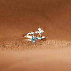 Double layered cross blue and white diamond open ring
